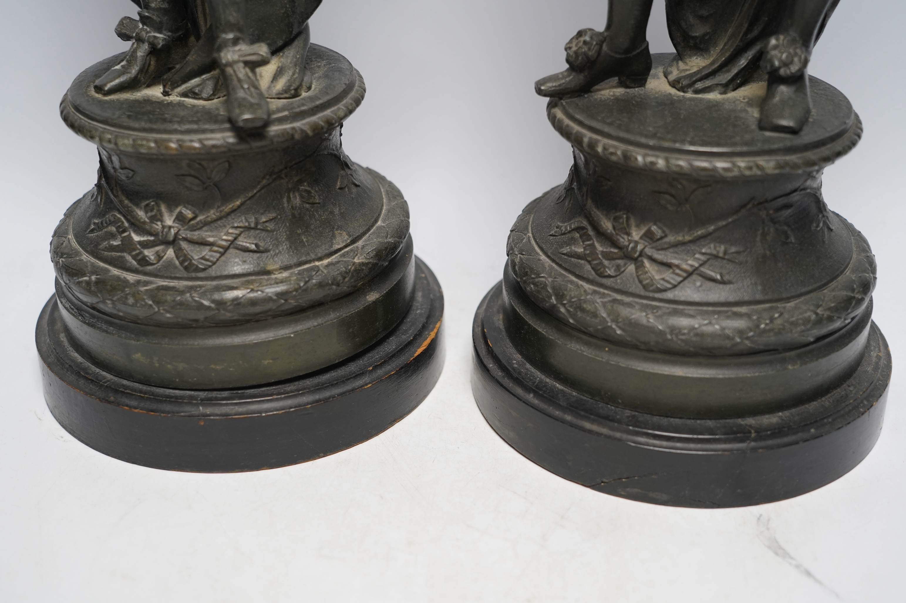 A pair of early 20th century spelter figures of cavaliers, 49cm